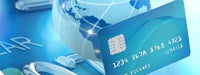 Credit card guide: World globe and credit card on bright blue credit card composition
