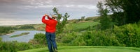 Retirement Guide: Man hitting ball on golf course