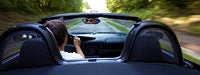 Man driving convertible