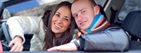 Smiling couple in car