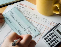 Writing a check to pay credit card bill