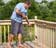 Power washing and sealing wood deck