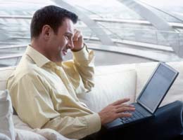 8-ways-to-avoid-becoming-successful-mark-8-online-lg Man using laptop