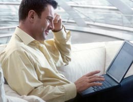 9-tips-refreshing-your-resume-7-linkedin-lg Middle-aged man using a laptop computer