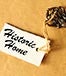 Antique key with historic home tag © Gunnar Pippel-Shutterstock.com
