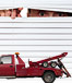A red tow truck for rep and a guy looking through the blinds