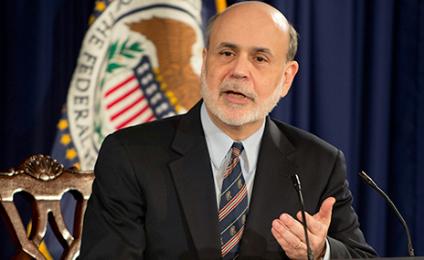Fed boss talks about tapering, not about his tenure