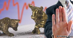 business man hand up stock market