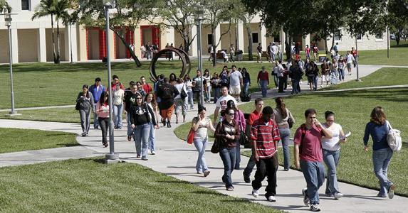 10 ways to pay college tuition in 2016 College students walking in campus grounds | Jeff Greenberg/Universal Images Group Editorial/Getty Images