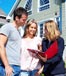 couple paperwork realtor house