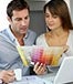 Couple reviewing paint samples at computer Konstantin Chagin/Shutterstock.com