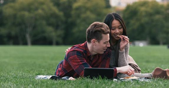 There's plenty of safety in U.S. Treasury securities Couple laying in the grass © dotshock/Shutterstock.com