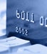 A credit card and a key board