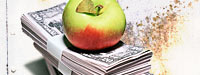 An apple on top of a stack of money and a dirty white background