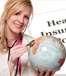 doctor with stethoscope on globe