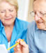elderly couple analyze statements
