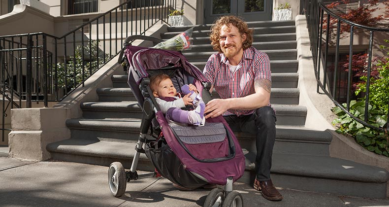 Mortgage rates rise slightly amid markets' Trump slump Father with his baby in a stroller, sitting on steps | Tooga/Getty Images