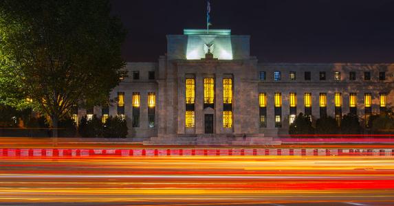 Rate hike or nah? Fed faces tough choice Federal Reserve building at night | Alexandre Deslongchamps/Moment Open/Getty Images