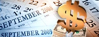 September calendars for 2008 and 2009, a stack of dollar bills and a gold "$" sign on top