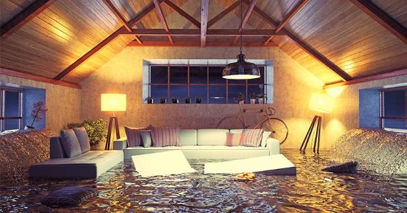 6 ways to protect your home from flooding Flooded living room © Zastolskiy Victor/Shutterstock.com