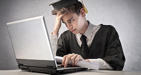 Frustrated grad student at laptop © olly - Fotolia.com