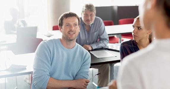 Tax credits for higher education Older students together in room, talking | Caiaimage/Tom Merton/Getty Images