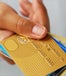 Hand holding multiple credit cards