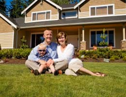 hidden-insurance-credits-1-intro-lg Family sitting in house's lawn