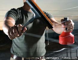 Laid-off banker becomes window cleaner Laid-off banker becomes window cleaner