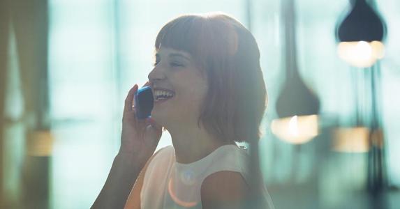 Find the right credit card when you have poor credit Laughing woman talking on cellphone | Tom Merton/Caiaimage/Getty Images