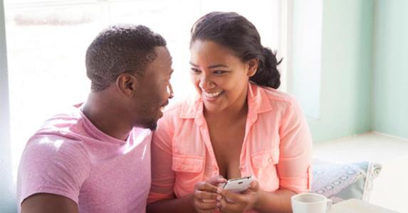 Americans have a big disconnect about saving money Excited couple | asiseeit/Getty Images