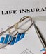 life insurance document on desk