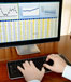 Man checking stocks on computer