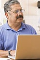Confused man holding up paper © Monkey Business - Fotolia.com