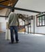 man standing in empty house
