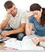 man woman struggling bills