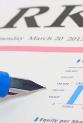 Market newspaper with pen and graph © tescha555/Shutterstock.com