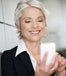 Mature woman using phone