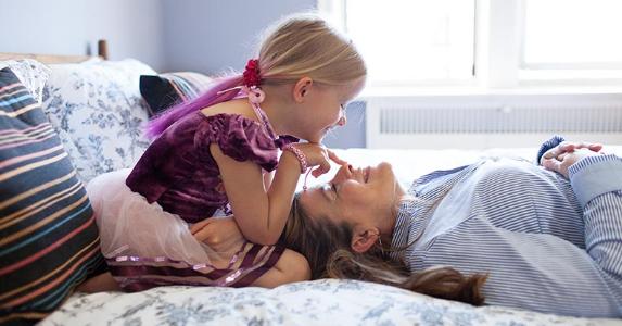 Properly defined dependents can pay off at tax time Mature lady and young girl playing in the bedroom | Jon Ragel/Getty Images