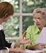 Mature woman paperwork agent © EdBockStock/Shutterstock.com