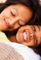 Mom hugging daughter