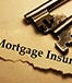 Mortgage insurance paper with keys ? isak55/Shutterstock.com