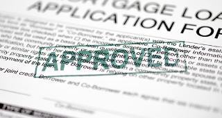 Approved mortgage loan application form © turhanyalcin / Fotolia.com