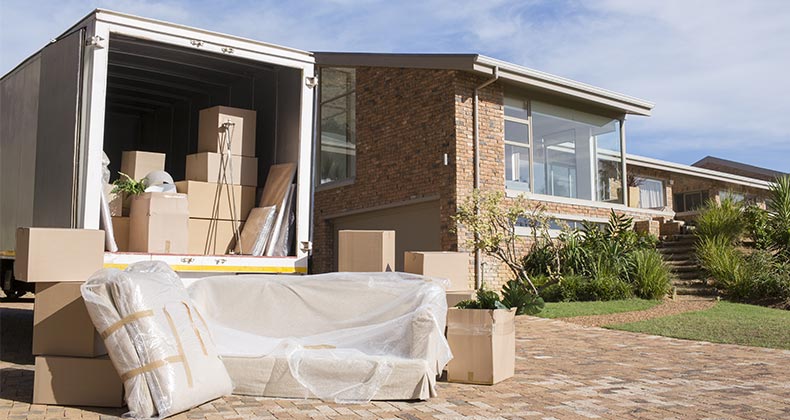 Fed reassures mortgage market, and rates fall Moving truck with furniture inside | Chris Ryan/Getty Images