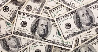 $100 bills © Luis Carlos Torres/Shutterstock.com
