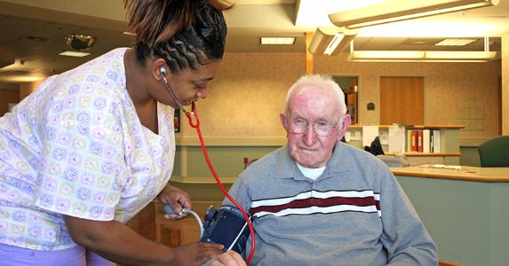 Nurse checking blood pressure © Andrew Gentry/Shutterstock.com