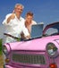 Older couple with pink car