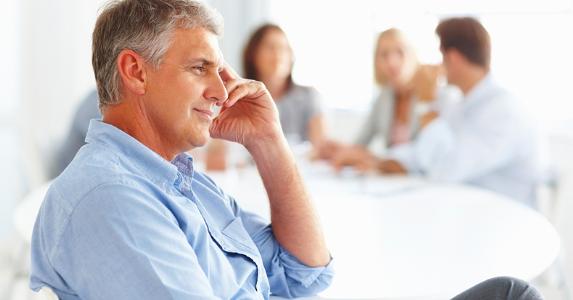 Man sitting in work meeting