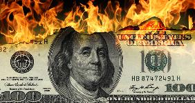 One hundred dollar bill burning: © bioraven/Shutterstock.com