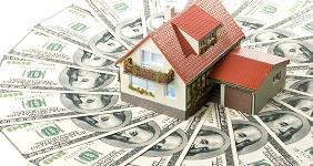 Peach house on money © Dmitry Melnikov/Shutterstock.com